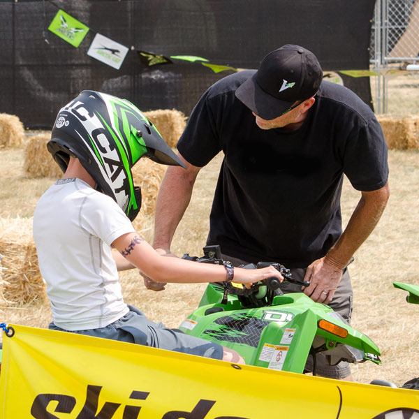 kid riding ATV